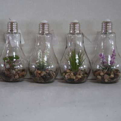 LED bulb-shaped lamp decorated with plants